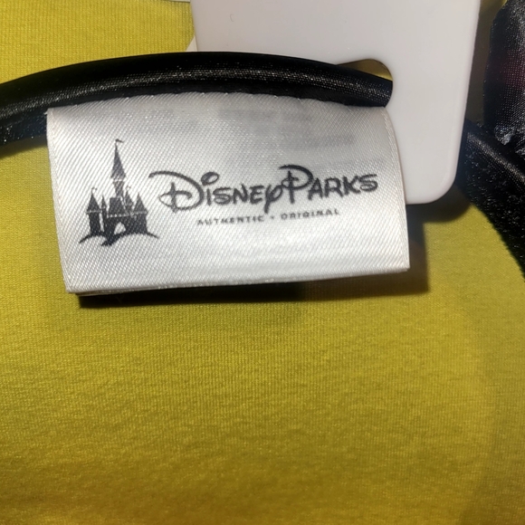 Disneys Minnie Mouse ear headband with a sequined bow and polka dot ears. NWT - Picture 4 of 6